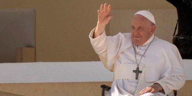 Pope waving