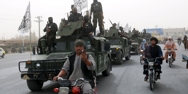 Taliban troops on a truck