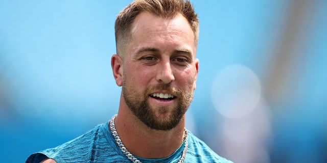 Adam Thielen looks on prior to a Panthers preseason game