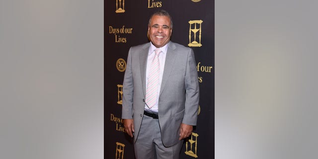 Albert Alarr posing on the red carpet