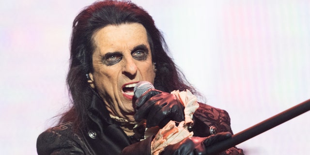 Alice Cooper performing on stage