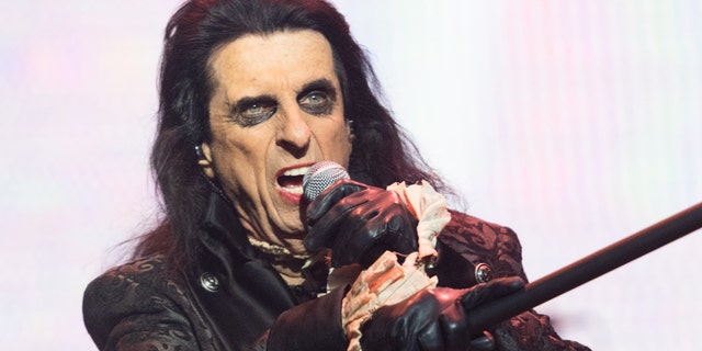 Alice Cooper performing on stage