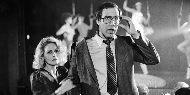 Beverly D'Angelo and Chevy Chase on set
