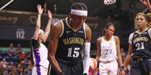 Brittney Sykes celebrates during a WNBA game