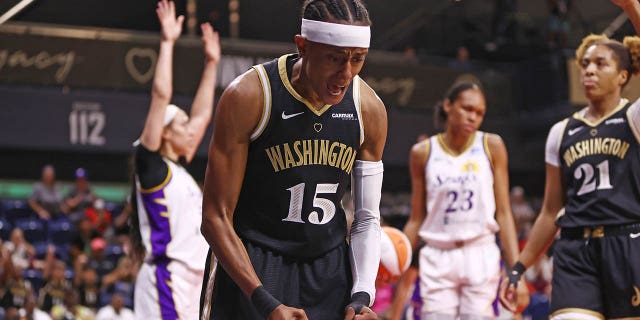 Brittney Sykes celebrates during a WNBA game