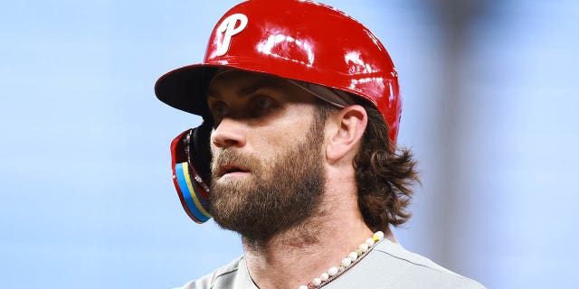 Bryce Harper looks on in the fourth inning