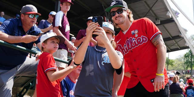 Bryson Stott interacts with Little Leaguers