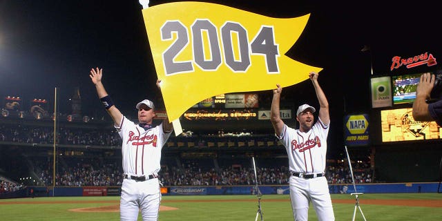 Chipper Jones and John Smoltz celebrate