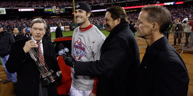 Cole Hamels with World Series trophy