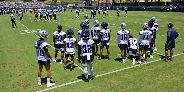 Cowboys players participate in practice drills 