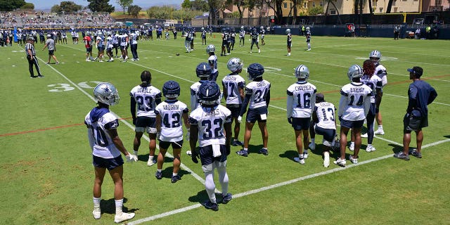 Cowboys players participate in practice drills 