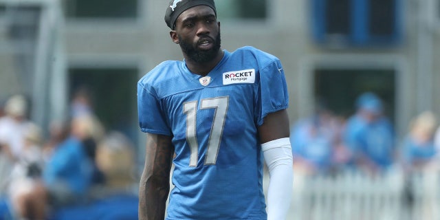 Lions wide receiver Denzel Mims walks off the field