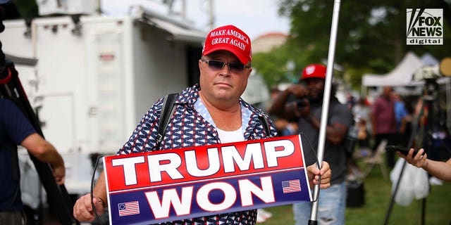 Supporters of former President Donald Trump rally outside of federal court ahead of Trump's arraignment