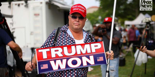 Supporters of former President Donald Trump rally outside of federal court ahead of Trump's arraignment