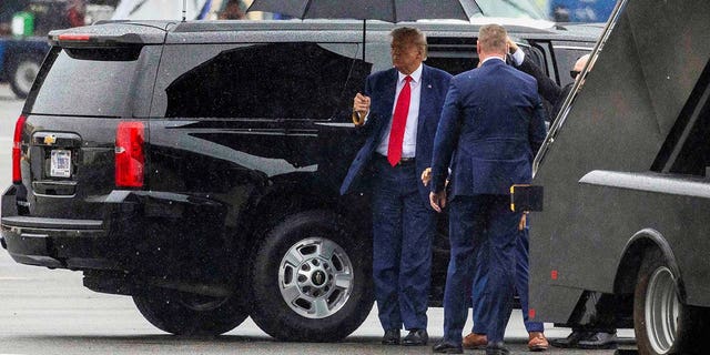 Donald Trump prepares to board his plane and depart Washington D.C.