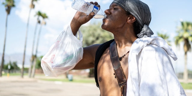 A man drinks water in Arizona