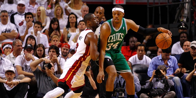 Dwyane Wade and Paul Pierce on the court