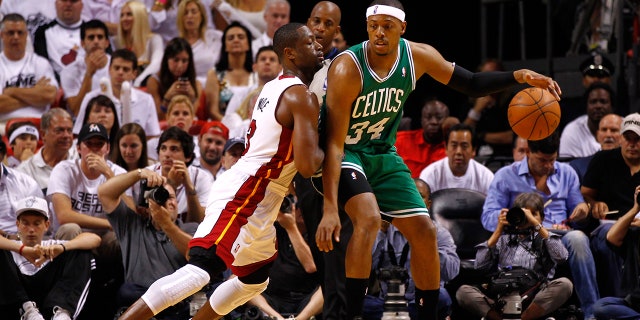 Dwyane Wade and Paul Pierce on the court