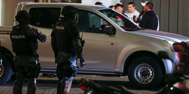 Ecuador police guard vehicle following Fernando Villavicencio shooting 