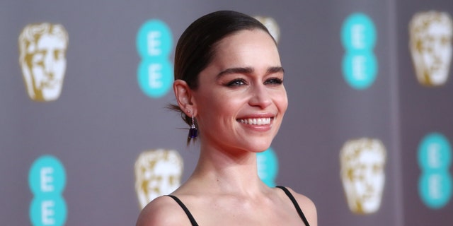 Emilia Clarke posing on the red carpet