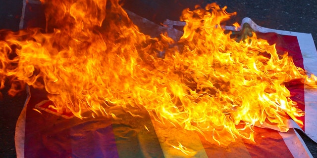 Iraq burning pride gay flag