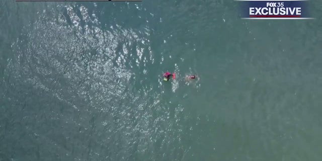 boogie boarder in ocean