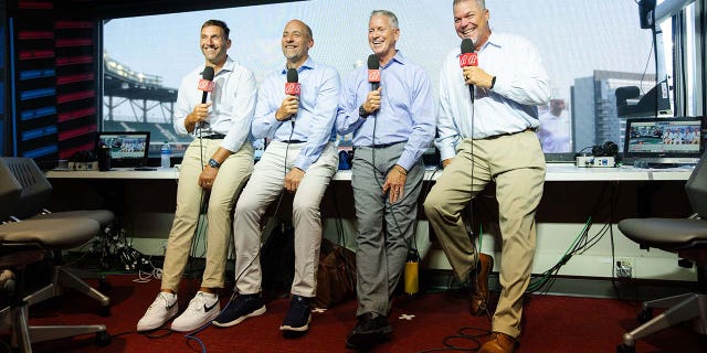 Former Braves players in the broadcast booth 