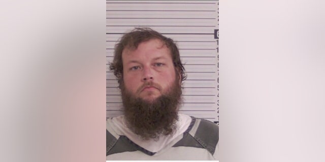 Mugshot of the Georgia man that baptized himself during a burglary.