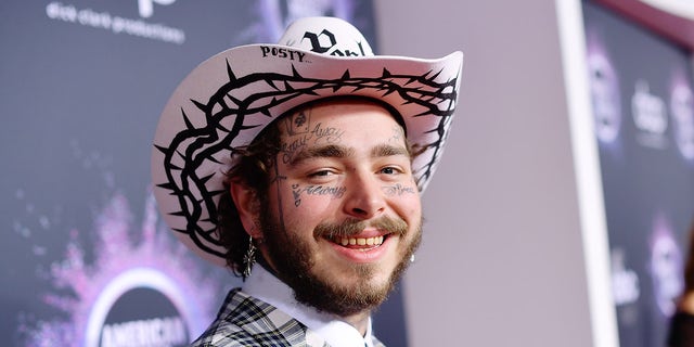 Post Malone wearing a cowboy hat