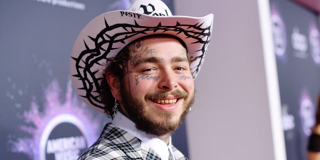 Post Malone wearing a cowboy hat