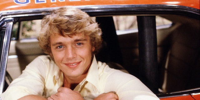 John Schneider as Bo Duke on the Dukes of Hazzard