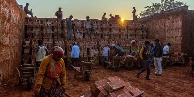 Nepalese workers at brick site