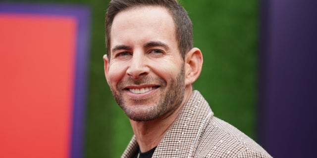 Tarek El Moussa smiling