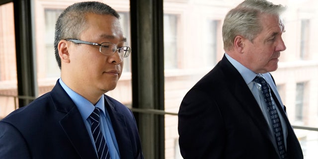 Tou Thao enters court