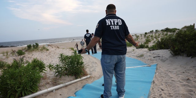 NYPD at Rockaway Beach after rare shark attack