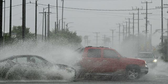 Cars driving in stormy weather