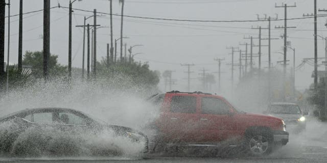 Cars driving in stormy weather