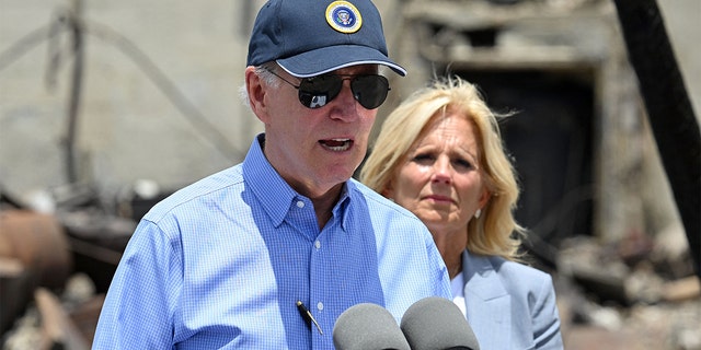 President Joe Biden in ball cap, blue shirt in Hawaii