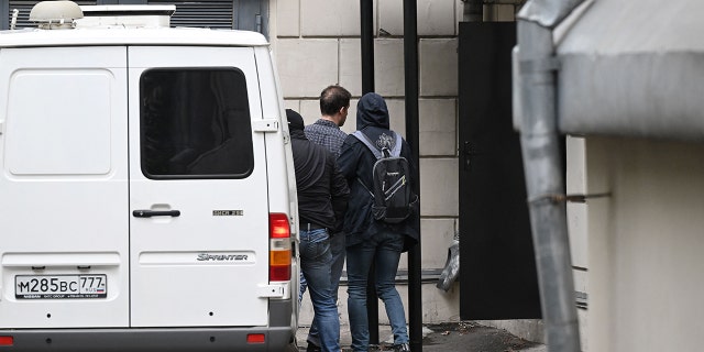 White van, Gershkovich, other officials