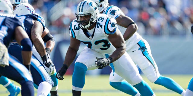 Oher playing for the Panthers