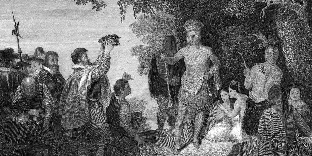 Black-and-white historical photo of Native Americans