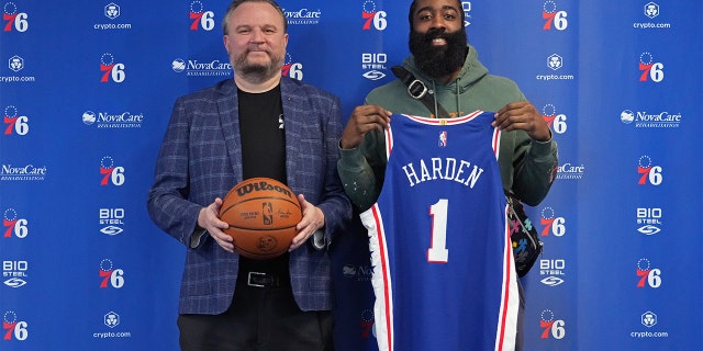 Daryl Morey and James Harden pose for a photo