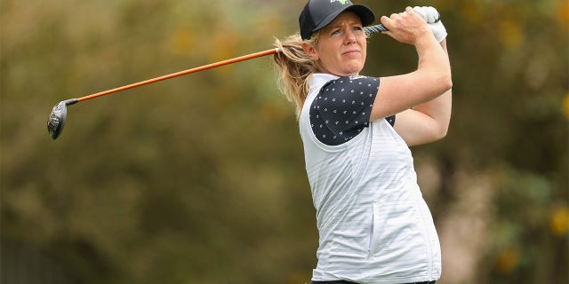 Amy Olson plays a shot a Pebble Beach