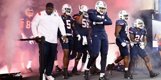 Arizona walks out before a game against Oregon