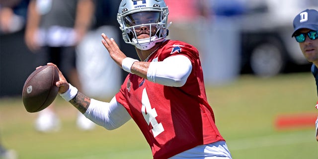 Dak Prescott throws at camp