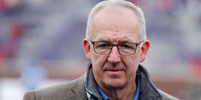 Greg Sankey attends a game