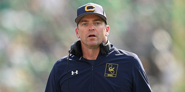 Justin Wilcox looks on against Notre Dame