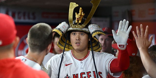 Shohei Ohtani celebrates a home run