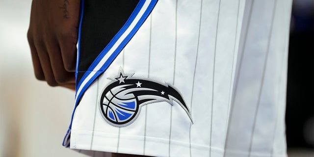 The Orlando Magic logo on a uniform