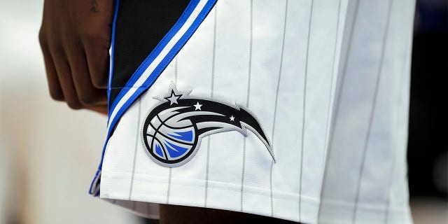 The Orlando Magic logo on a uniform